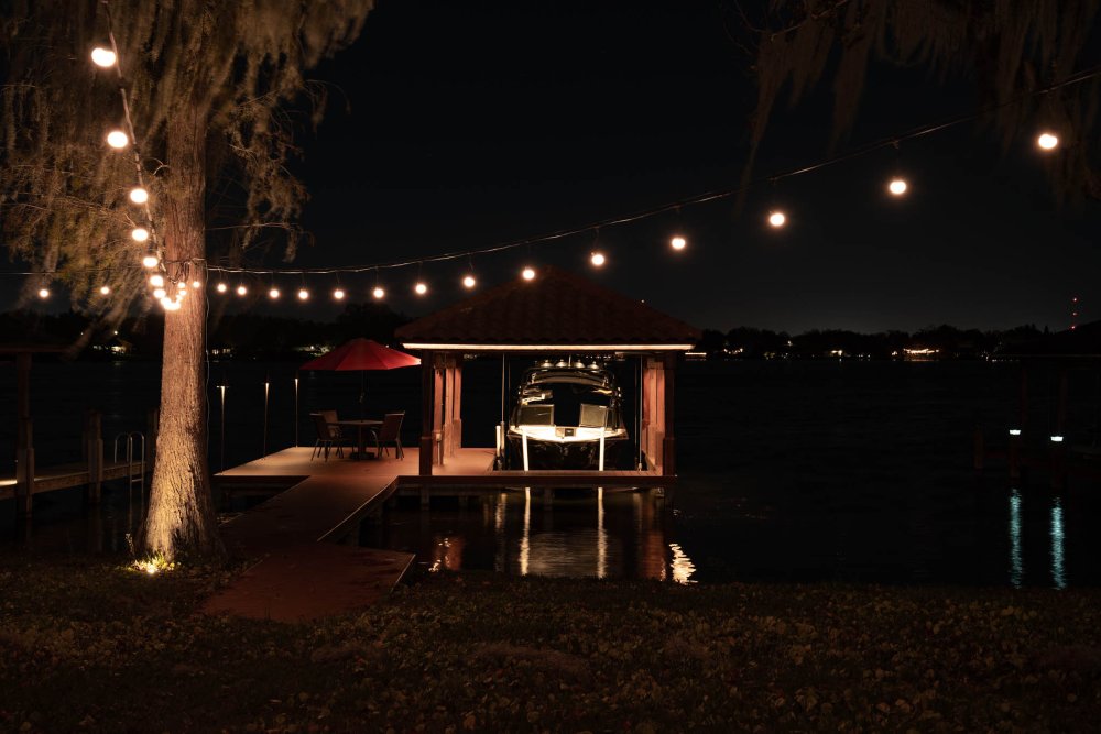 bistro lighting on dock after dark